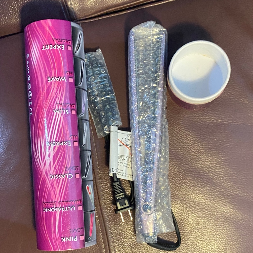 Pink Hair Styling Tool with Silver Accents